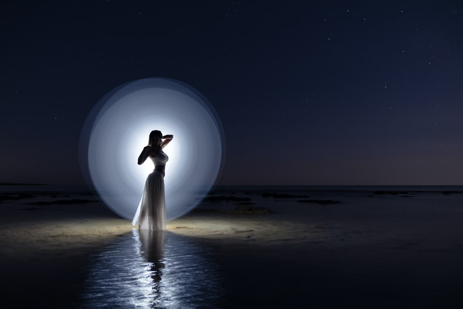 night beach ocean angel beautiful woman light painting