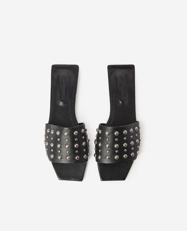 Flat studded black leather sandals | The Kooples