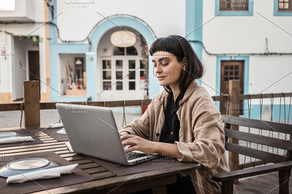 Woman in cafe with laptop | High-Quality People Images ~ Creative Market