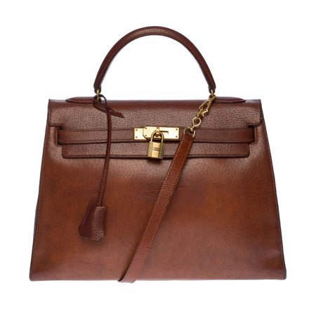 Hermès Kelly 32 handbag with strap in Brown Pecari leather