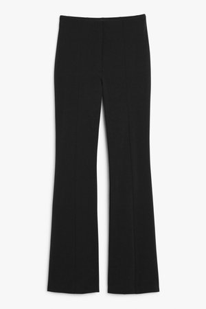 High-waist flared trousers - Black - Trousers - Monki