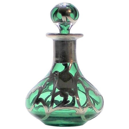 green glass perfume bottle