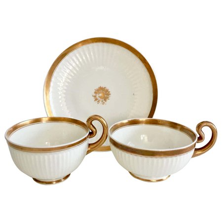 Swansea Porcelain Tea Set, Tea and Breakfast Cup White and Gilt, Regency ca 1820 For Sale at 1stDibs