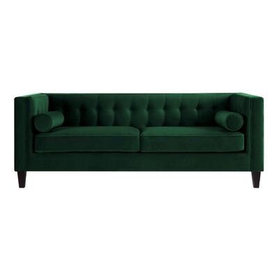 green velvet sofa couch