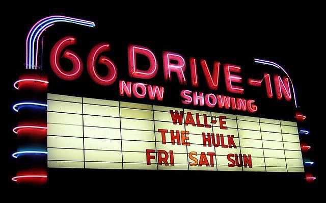 neon drive in theater sign