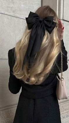 blonde hair with black bow