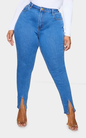 Plus Mid Blue Wash Split Front Skinny Jeans | PrettyLittleThing USA