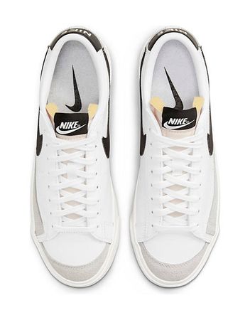 Nike Blazer Low sneakers in white and black | ASOS