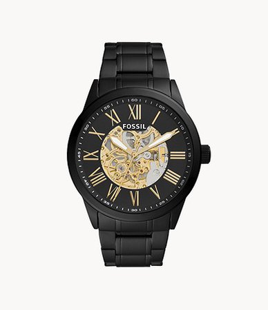 Black and gold fossil watch