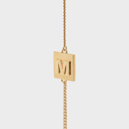 Celine Alphabet Bracelet in Brass with Gold Finish $590