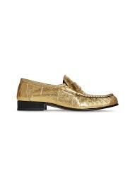 the row gold loafers