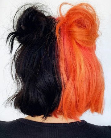 orange and black two bun with bangs hairstyle