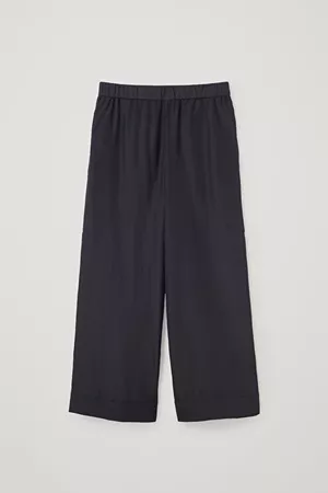 DROPPED CROTCH WIDE-LEG TROUSERS - Black - Trousers - COS WW