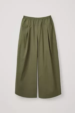 VOLUMINOUS CROPPED TROUSERS - Khaki Green - Trousers - COS