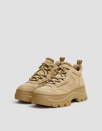 Sand-colored high-top sneakers