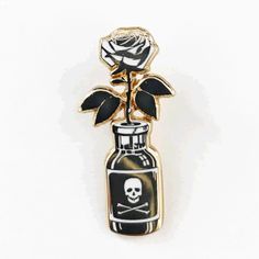 poison flower bottle pin