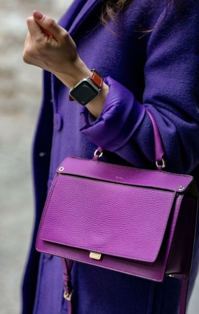 purple outfit with purple handbag