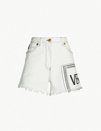 VERSACE - Frayed-hem logo-print high-rise denim shorts | Selfridges.comm