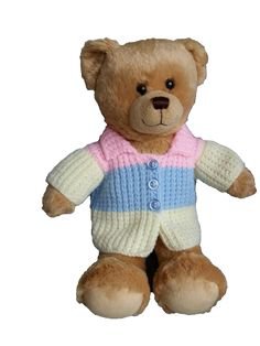 teddy bear in a cardigan