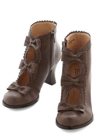 brown boots with bows