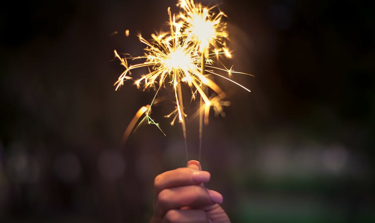 Person Holding Lighted Sparkler · Free Stock Photo