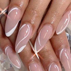 white and nude almond shaped nails