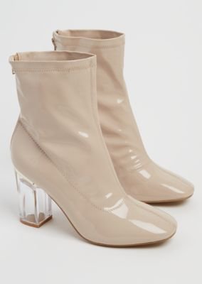 Nude patent booties
