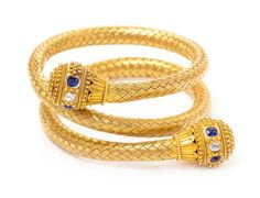 An Etruscan Revival Yellow Gold, Sapphire and Diamond Wrap Bangle Bracelet