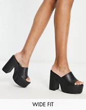 Simmi London Lala platform mule sandals in black | ASOS