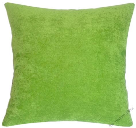 green throw pillow at DuckDuckGo
