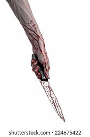 bloody hand holding a knife