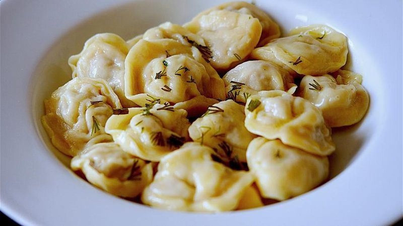 Hand-made Russian pelmeni filled with beef, onions and garlic.