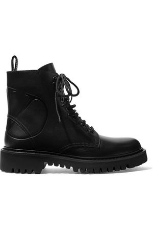 Valentino | Valentino Garavani logo-debossed leather ankle boots | NET-A-PORTER.COM