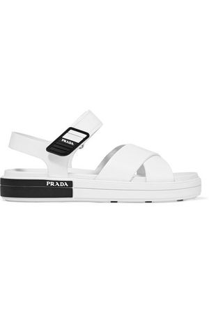 Prada | Logo-embossed rubber-trimmed leather sandals | NET-A-PORTER.COM