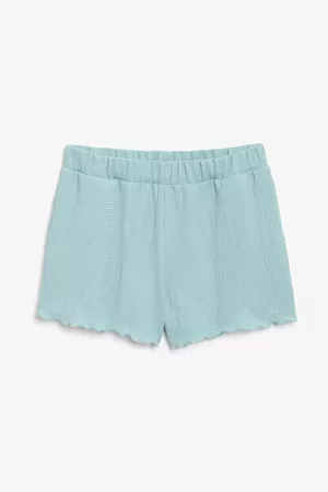 Textured shorts - Light turquoise - Trousers & shorts - Monki WW