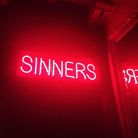 'Sinners' neon sign