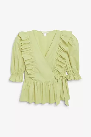 Ruffled wrap blouse - Pistachio green - Tops - Monki WW