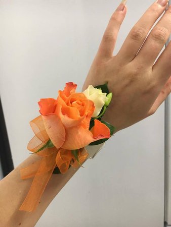 Orange rose wrist corsage