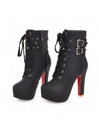 Black high heel boots w/ red heel