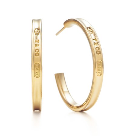 Tiffany 1837™ narrow hoop earrings in 18k gold, medium. | Tiffany & Co.