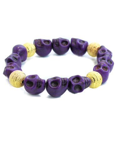 Purple carved Howlite skull stretch bracelet