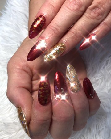 Bradford Nails on Instagram: “GLASS RED CHROME, gold glitter, Christmas design, gems Perfect for Christmas and holiday #redchromenails #glassredchrome #chromenails…”