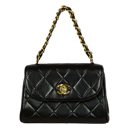 Chanel '90s Black Vintage Quilted Mini Flap Bag with Leather Laced Handle For Sale at 1stdibs