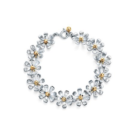 Return to Tiffany® Love Bugs daisy line bracelet in sterling silver and gold. | Tiffany & Co.