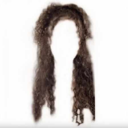 brown black curly hair half up half down ponytail
