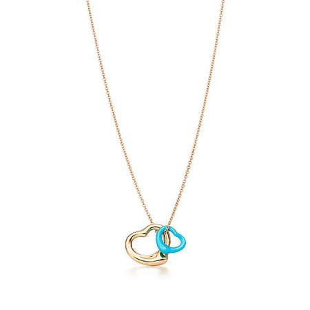 Elsa Peretti™ Open Heart pendant in 18k gold and turquoise. | Tiffany & Co.