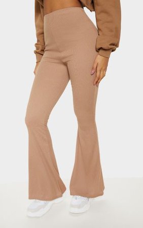 Camel Ribbed Flared Trouser | Trousers | PrettyLittleThing