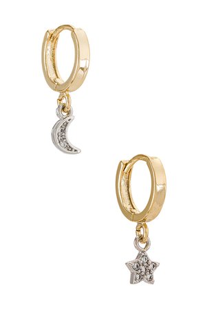 Natalie B Jewelry Starry Nights Mismatched Moon & Star Huggies in Gold | REVOLVE