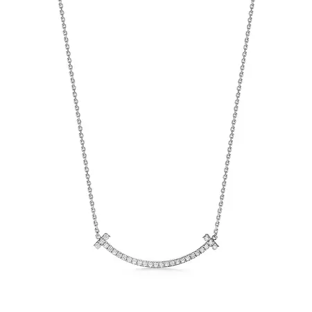 Tiffany T medium smile pendant in 18k white gold with diamonds. | Tiffany & Co.