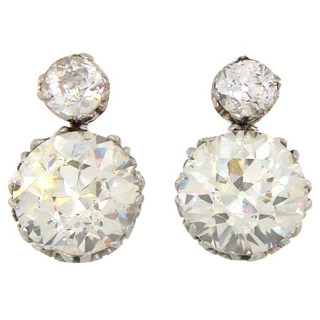 1900s Diamond Silver Gold Two-Stone Stud Earrings For Sale at 1stdibs